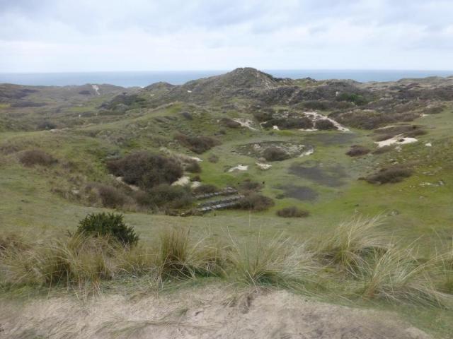 An embanked enclosure, or traverse, which would have contained a timber cartridging hut. Copyright Historic England (Samantha Barnes)